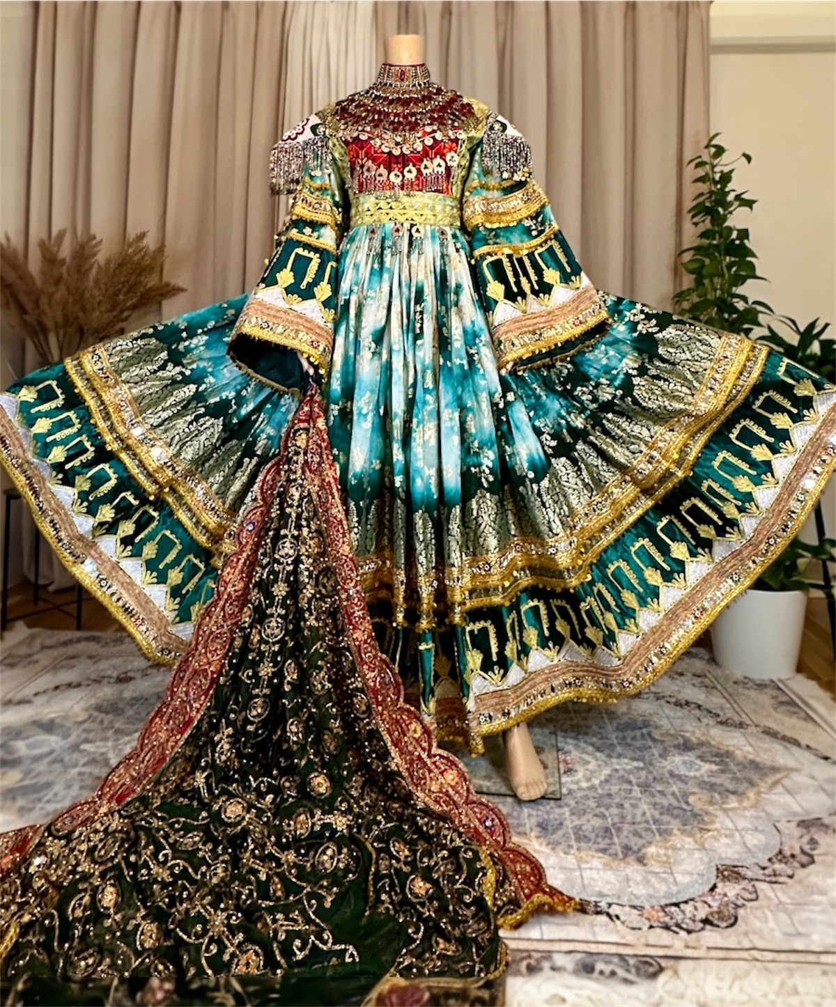 Long Afghan dress in green Banaras with rich Charmadozi, Sekeh-dozi and Mor-dozi, matching shal, crepe shalwar, free size (EU 36–42).