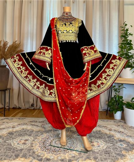 Afghan traditional dress made of black Makhmal with chest Charmadozi and Sekeh-dozi,paired with Sorkh Geybi shalwar and Sorkh Gaj shal, free size (EU 36–42).