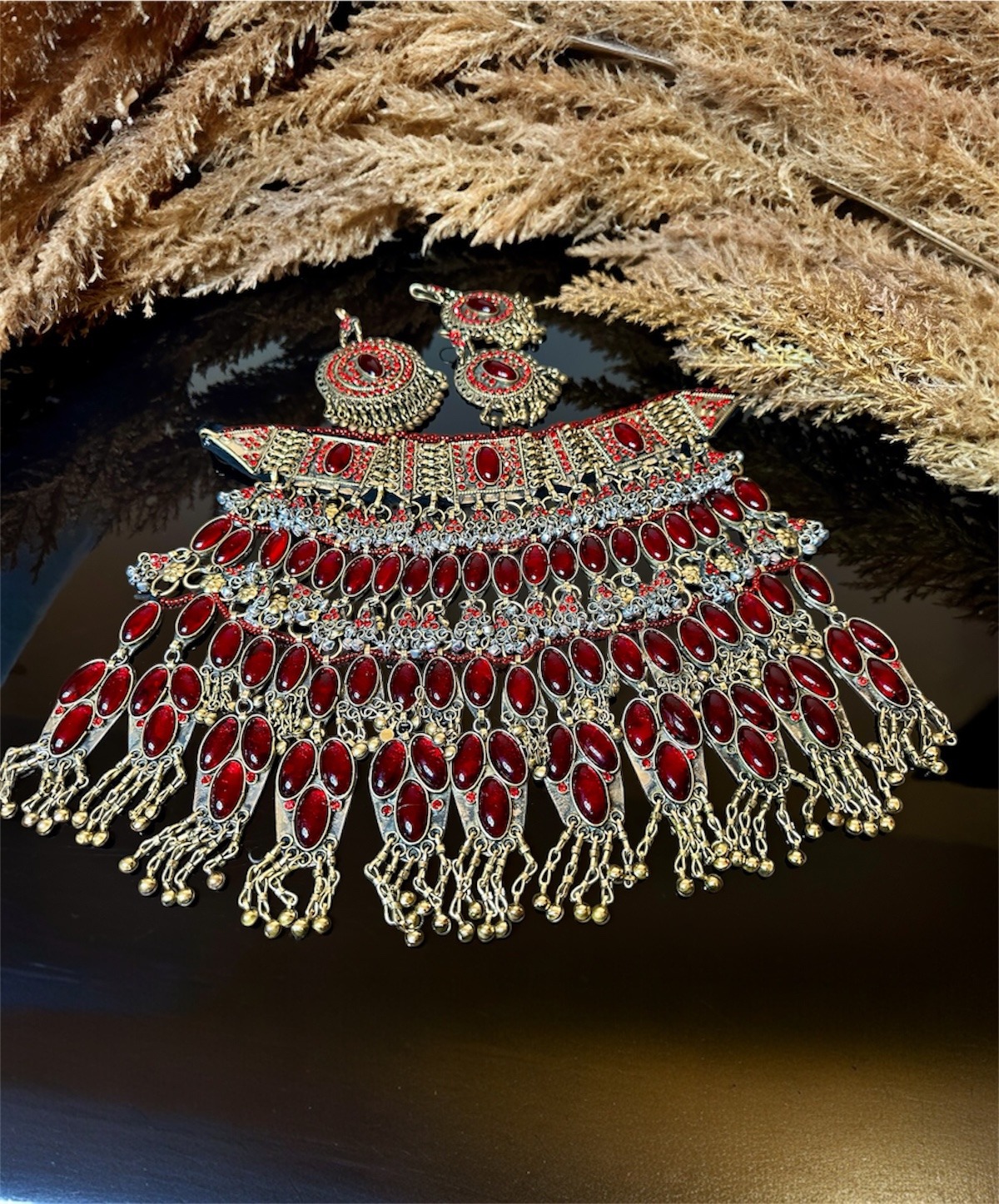 Traditional Afghan decorative jewelry set with deep red Yaqut stones, rich detailing, ideal for Gand Afghan dresses and festive events.