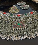Zar-o-Zanjir is a traditional Afghan decorative jewelry piece featuring handcrafted metalwork, rich chain detailing, and multicolor accents, perfect for Gand Afghan outfits.