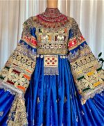 Long blue ceremonial dress with Sekka-dozi and Charmadozi. Comes with blue Indian shal and blue crepe shalwar. Free size (EU 36–42), length 145 cm.