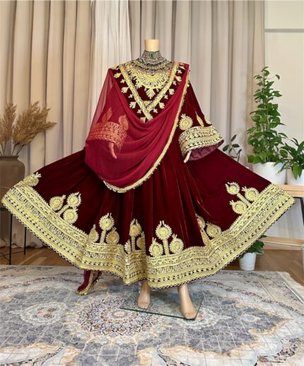 Long maroon Makhmal dress with refined leatherwork on neckline, hem, and sleeves, paired with maroon gaj shal and maroon crepe pants. Free size (EU 36–42).