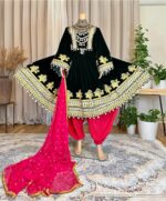 Dark green Makhmal dress with leatherwork on the bodice, skirt, and sleeves, paired with pear-colored ghibi pants and a gaj shal. Free size (EU 36–42).