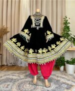 Dark green Makhmal dress with leatherwork on the bodice, skirt, and sleeves, paired with pear-colored ghibi pants and a gaj shal. Free size (EU 36–42).