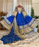 Long blue ceremonial dress with Sekka-dozi and Charmadozi. Comes with blue Indian shal and blue crepe shalwar. Free size (EU 36–42), length 145 cm.