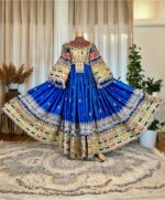Long blue ceremonial dress with Sekka-dozi and Charmadozi. Comes with blue Indian shal and blue crepe shalwar. Free size (EU 36–42), length 145 cm.