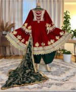 Maroon Makhmal dress with Charmadozi on chest, skirt, and sleeves. Comes with green Gaj shal and green Gibi shalwar. Free size (EU 36–42)