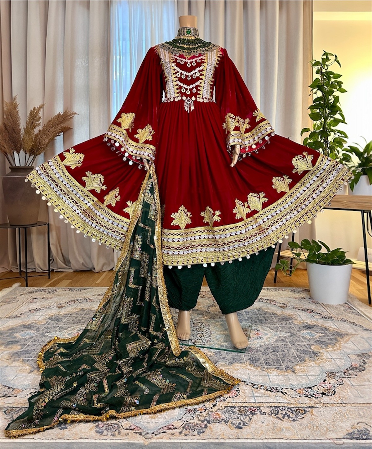 Photoroom_20260209_220300 Maroon Makhmal dress with Charmadozi on chest, skirt, and sleeves. Comes with green Gaj shal and green Gibi shalwar. Free size (EU 36–42)